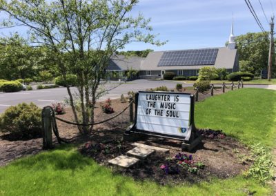 sign at Saint Peter's Lutheran church laughter is the music of the soul