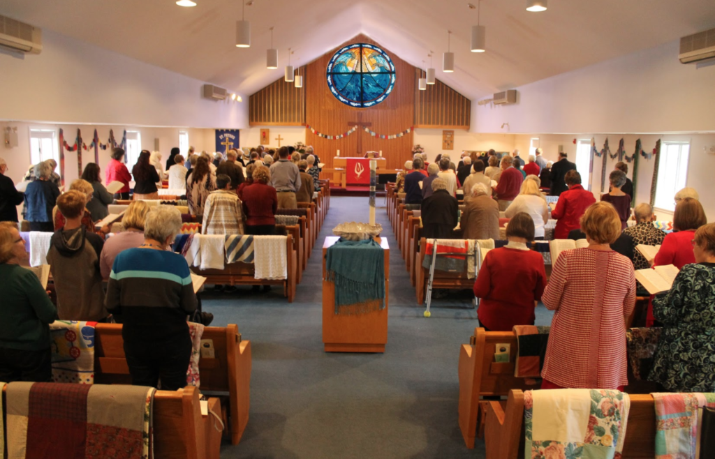 photo of worshipers at Saint Peter's Lutheran church interior