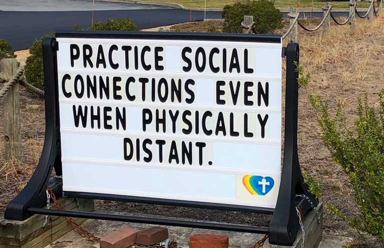 outdoor sign at Saint Peter's Lutheran "Practice Social Connections even when physically distant"